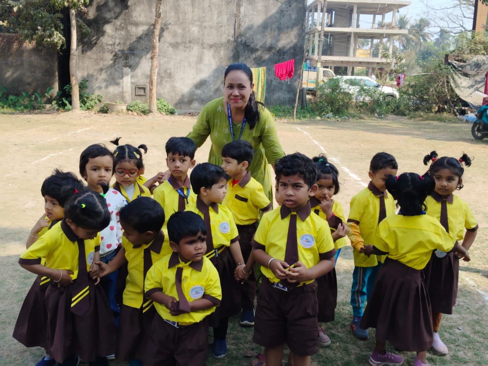 Teacher with students at ALINGON™ Academy outdoor activity