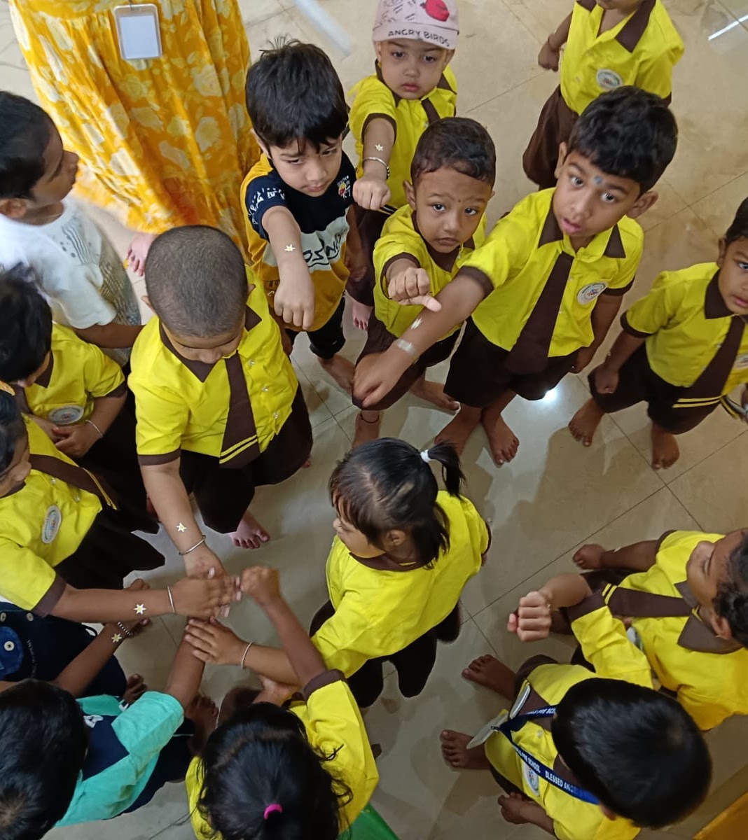 Children in learning circle activity at ALINGON™ Academy